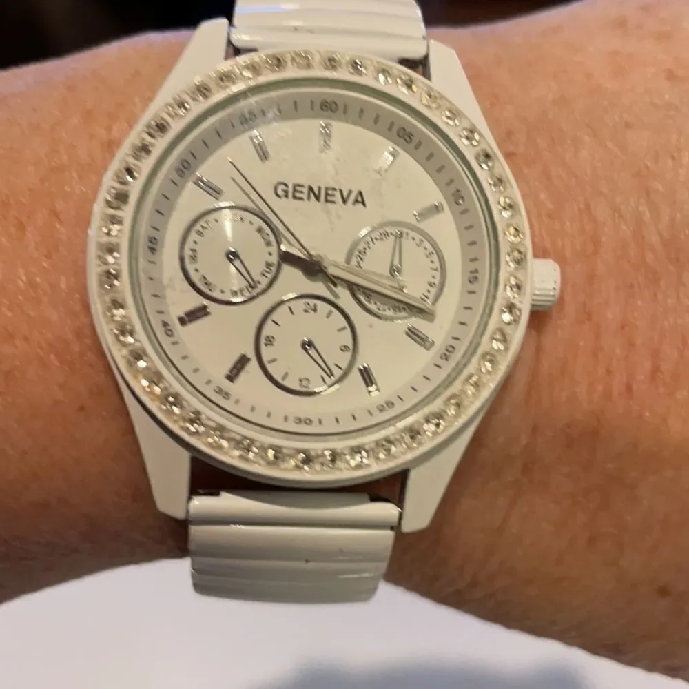 Geneva Ladies Analog Watch White Face Rhinestones White Metal Stretch Band